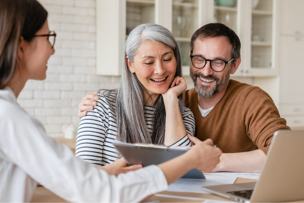 Financial advisors reviewing plans together